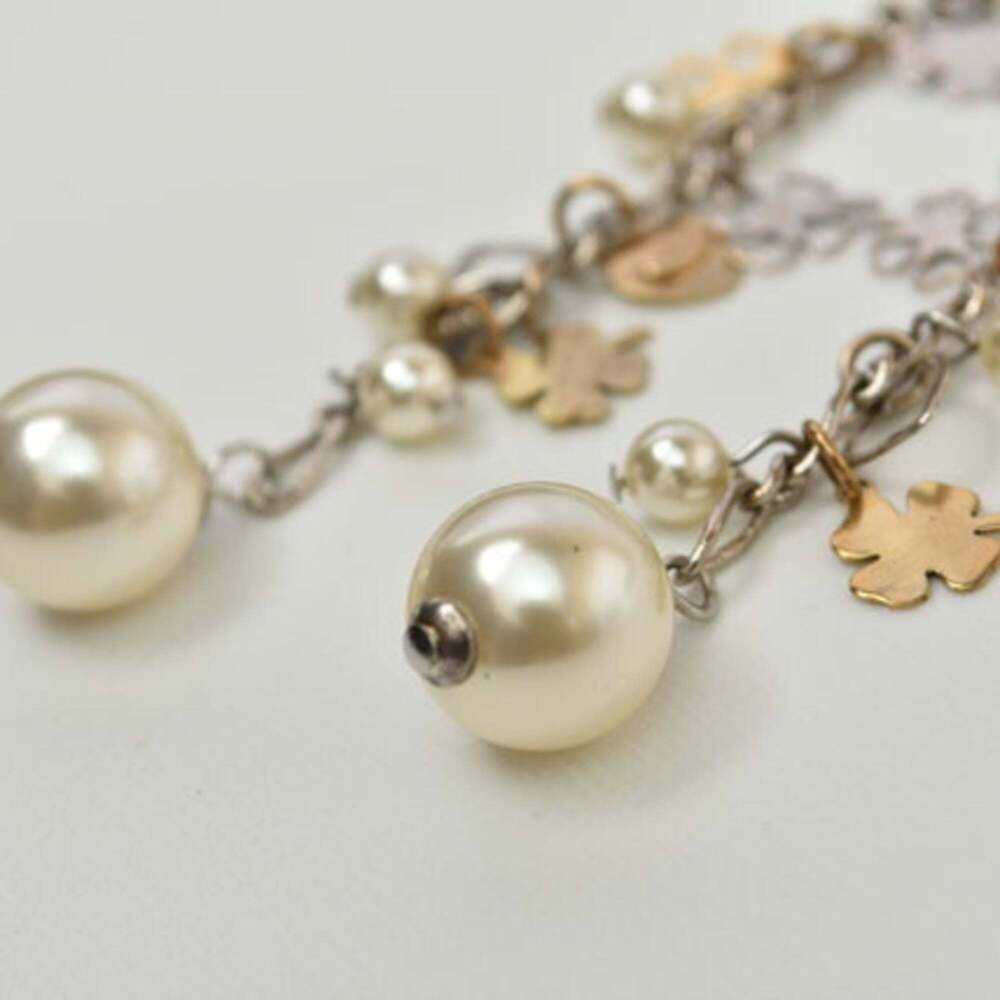 CHANEL Gold Pearl Love Earrings - Picture 5 of 8